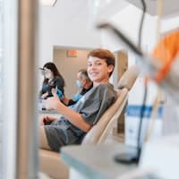 Happy patient at Aura Dental